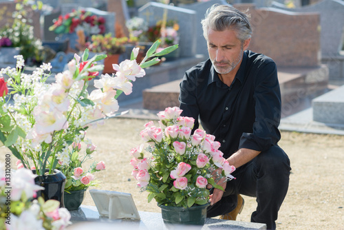 mourning at a grave