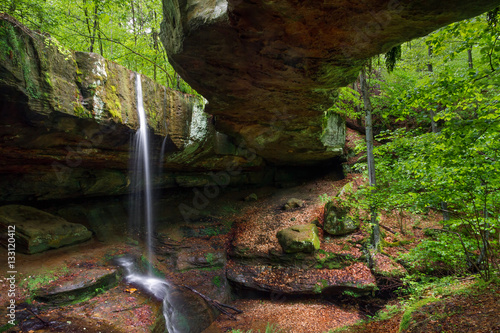 Rock Bridge in the Hocking Hills of Ohio - a natural rock bridge with slender waterfall photo