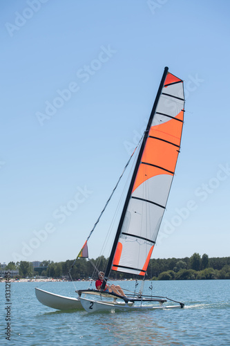 sailing on a lake - summer and sports theme photo