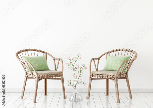 Vertical interior mock up with empty wooden frame and blooming twig on wooden wall background. 3D rendering.