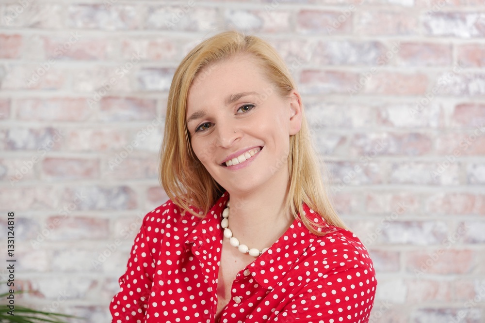beautiful young blonde woman with red and white shirt beautiful young blonde woman with red and white shirt