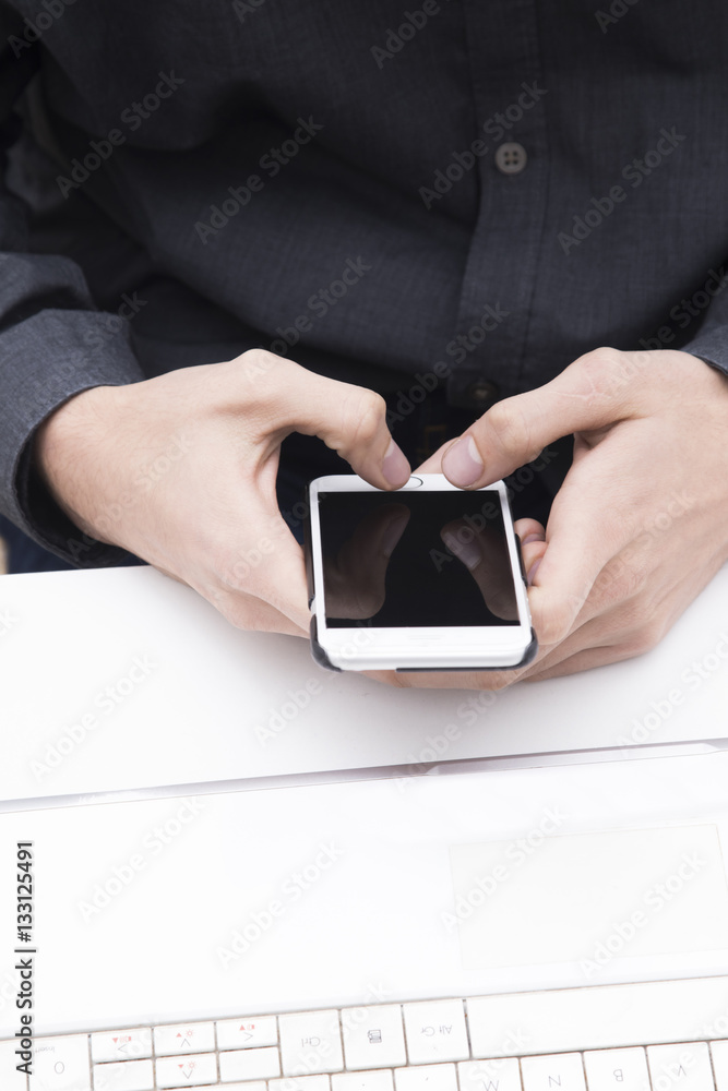 closeup of hands with the phone on your desktop closeup of hands with the phone on your desktop