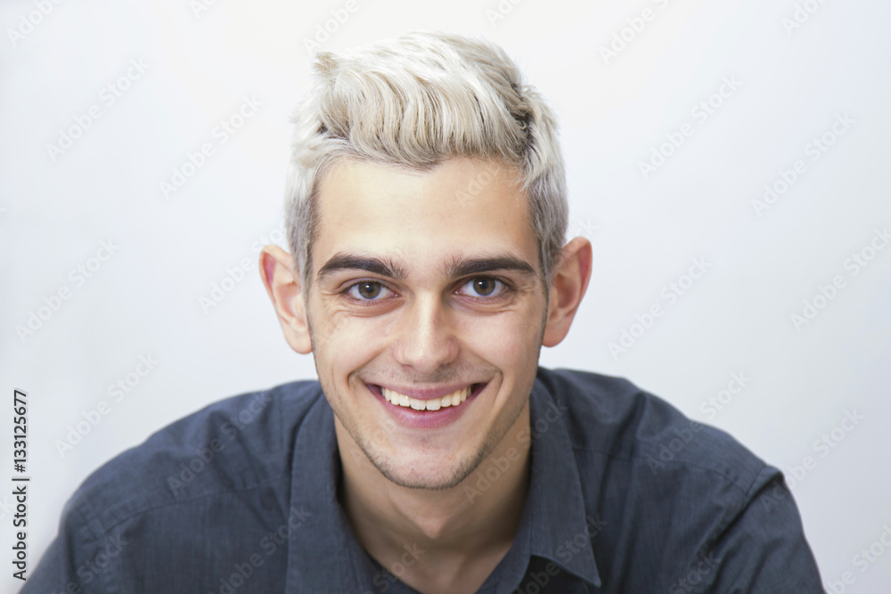 portrait of a modern young man with the white hair, isolated on white background portrait of a modern young man with the white hair, isolated on white background