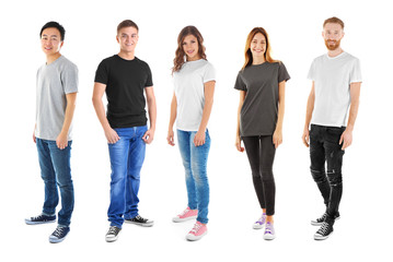 Young people wearing different t-shirts on white background