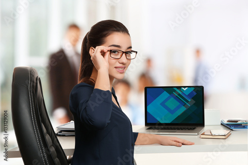 Young businesswoman working...