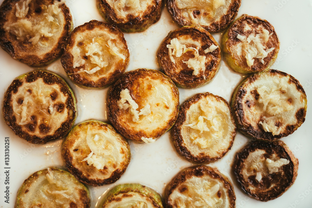 Fried zucchini with garlic