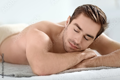 Man relaxing in spa salon