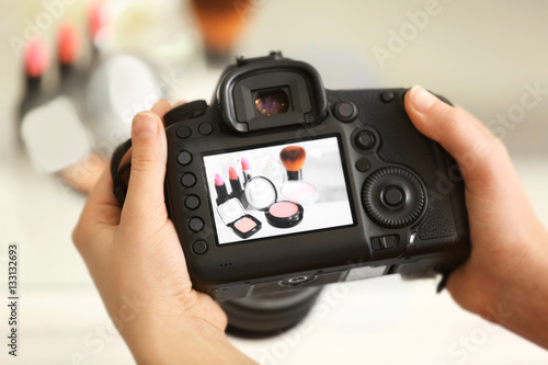 Photo of makeup kit on camera display while shooting