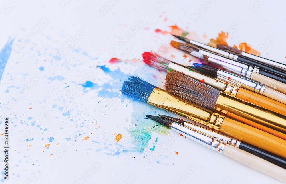 Obraz premium artistic brushes on wooden background