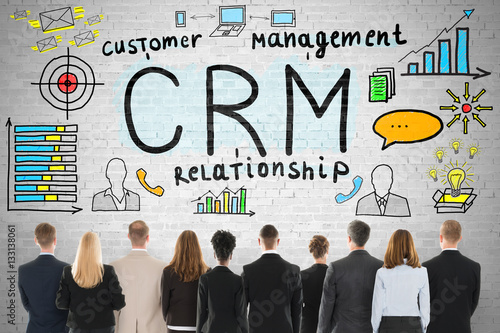 Businesspeople Looking At Customer Relationship Concept