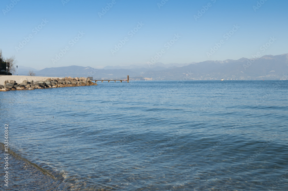 View of the Lake Garda beach during winter, from Peschiera del G