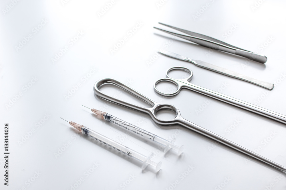 instruments for plastic surgery on white background instruments for plastic surgery on white background