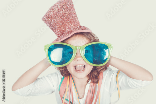 five-year-old girl with Party Glasses