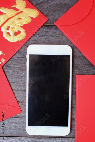Red envelope in chinese new year festival with smart phone