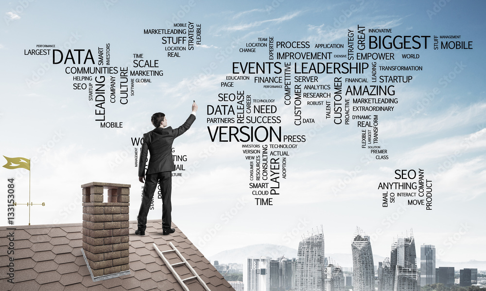 Businessman on brick roof draw world map as concept of globaliza Businessman on brick roof draw world map as concept of globaliza