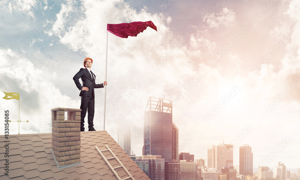 Young businessman with flag presenting concept of leadership. Mi