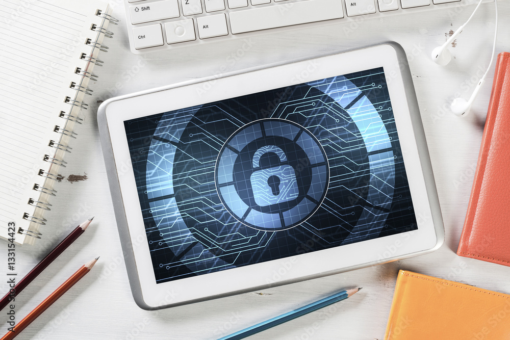 Web security and technology concept with tablet pc on wooden tab Web security and technology concept with tablet pc on wooden tab