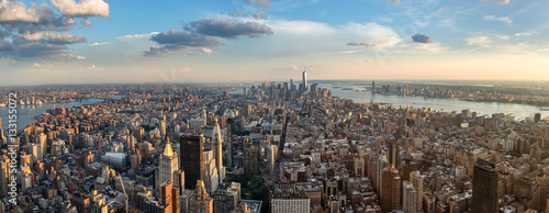 New York Manhattan - Skyline Panorama wide angle NYC afternoon cityscape panoramic view manhattan downtown moody sky mood early evening cloudy sky inner city rooftops early morning morningshot clouds photo
