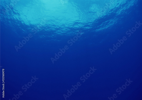 Background of bright blue underwater. 