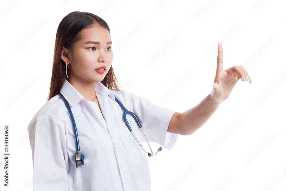 Young Asian female doctor touch a screen. Young Asian female doctor touch a screen.