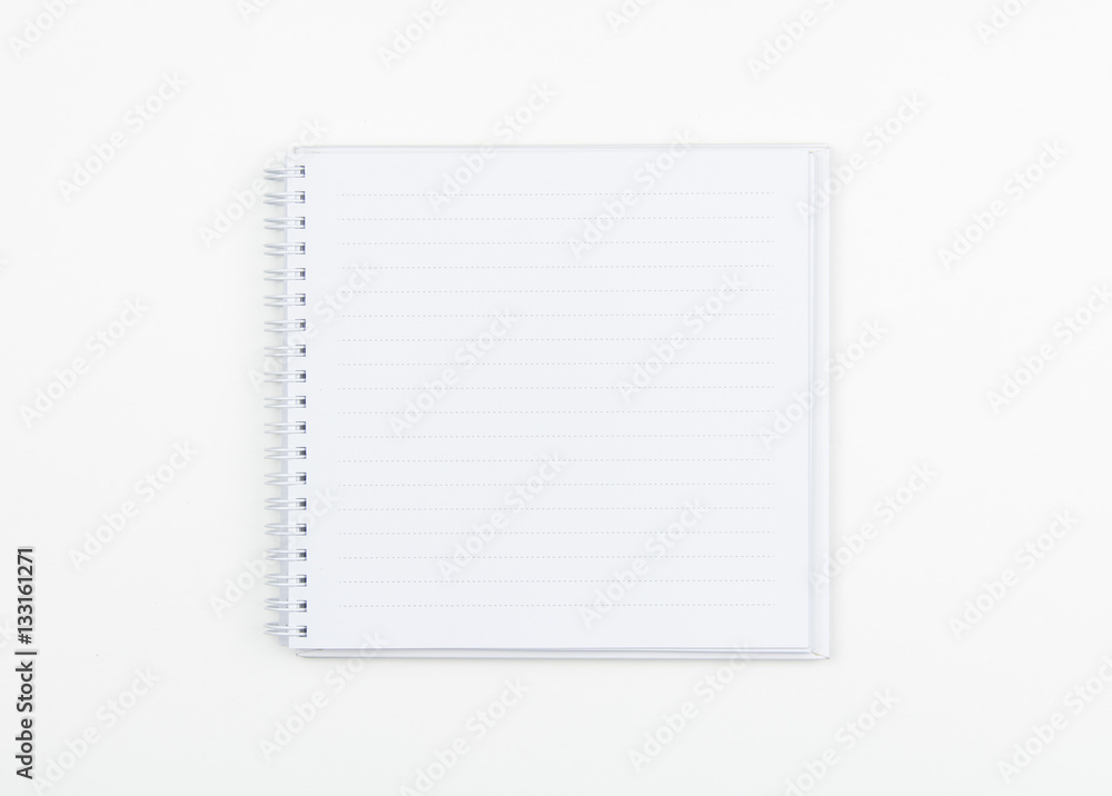 Top view of white spiral book on white Top view of white spiral book on white