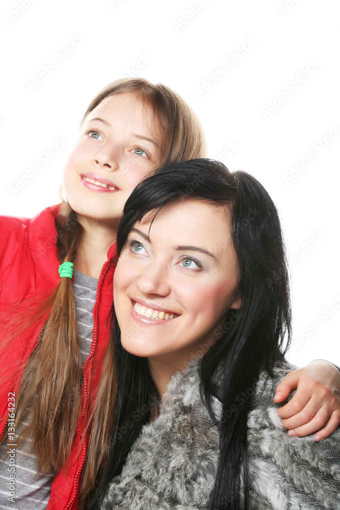 mother with the daughter isolated on light background mother with the daughter isolated on light background