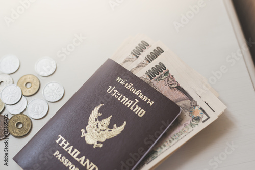 Close up of Passport and currency background