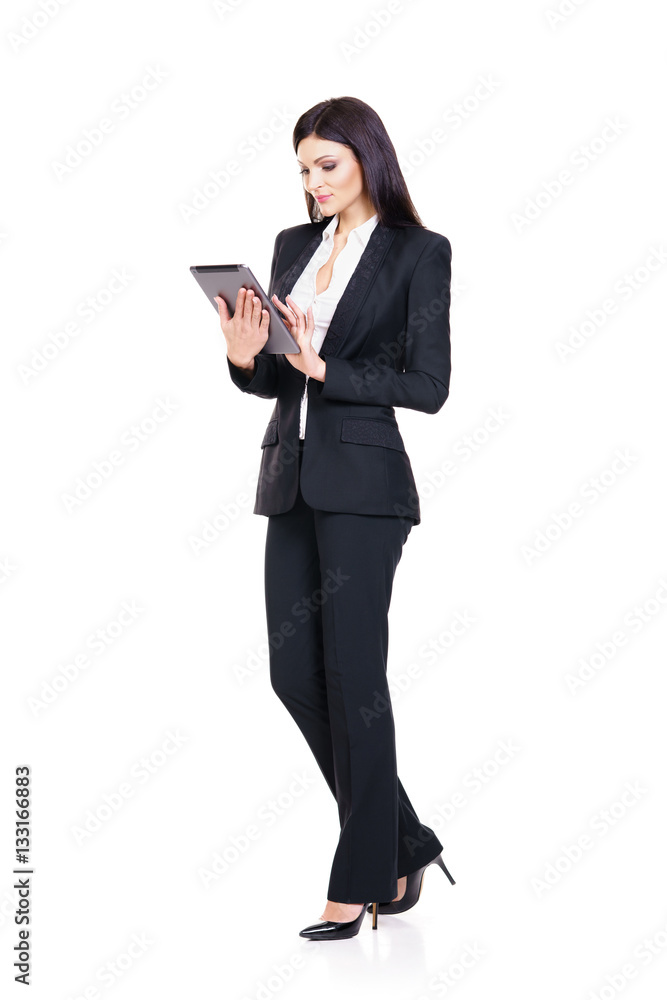 Young and beautiful businesswoman with a tablet Young and beautiful businesswoman with a tablet