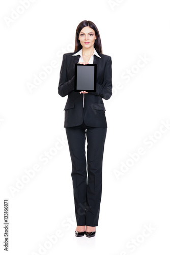 Young and beautiful businesswoman with a tablet