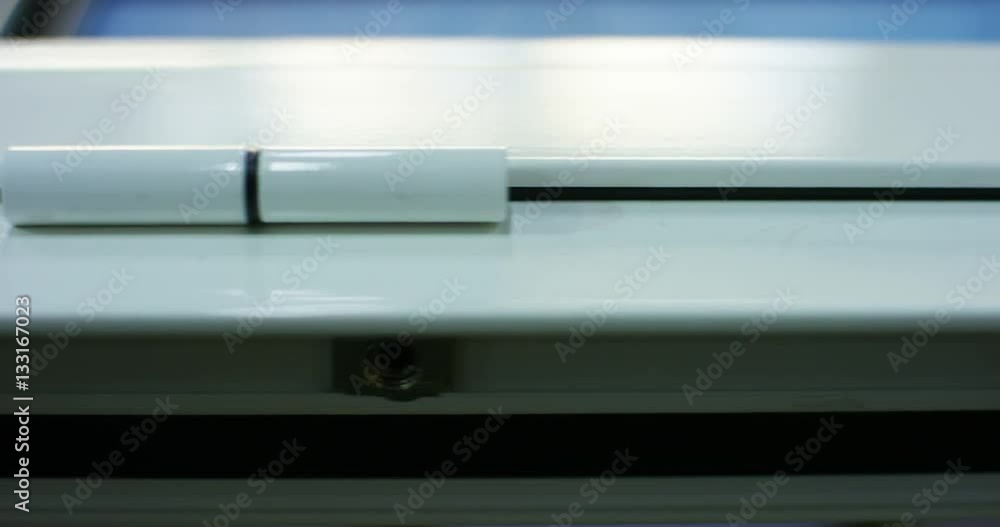 macro of a window frame,a door, window or blinds,with the details on the handles or on its hinges,the frame can be wood,aluminum,with thermal insulation.Concept:construction,energy conservation,design macro of a window frame,a door, window or blinds,with the details on the handles or on its hinges,the frame can be wood,aluminum,with thermal insulation.Concept:construction,energy conservation,design