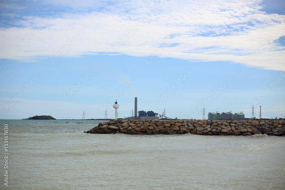 Rock breakwater and Blue sky in Rayong at Thailand