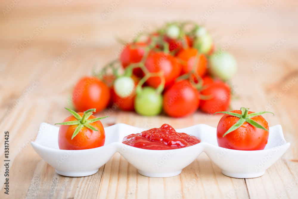 tomato sauce and fresh tomato on wooden background tomato sauce and fresh tomato on wooden background