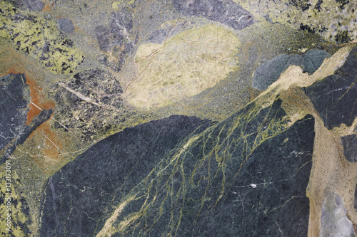 Mineral background. Breccia stone macro detail. Geology gemstone photo