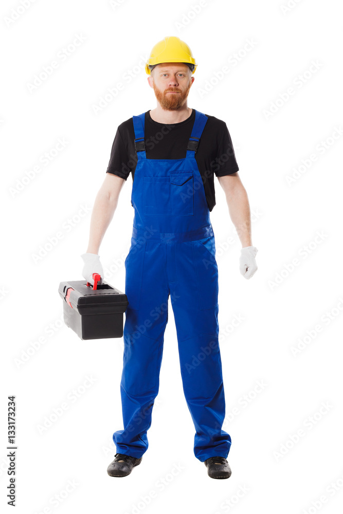 Man builder in the uniform holds a tool box Man builder in the uniform holds a tool box