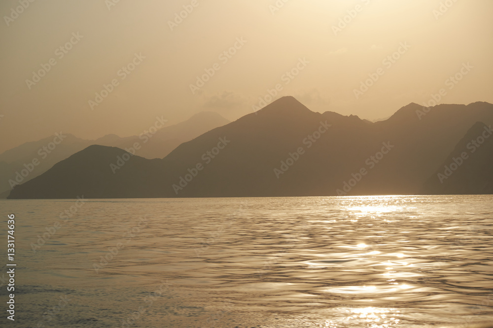 Oman sunset sea mountains