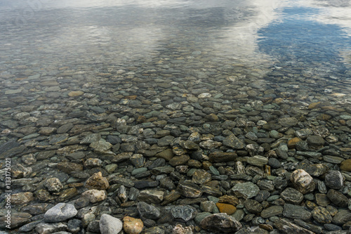 Stones through shallow water