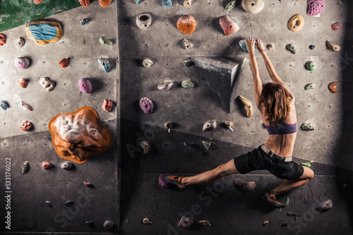 woman practicing rock-climbing