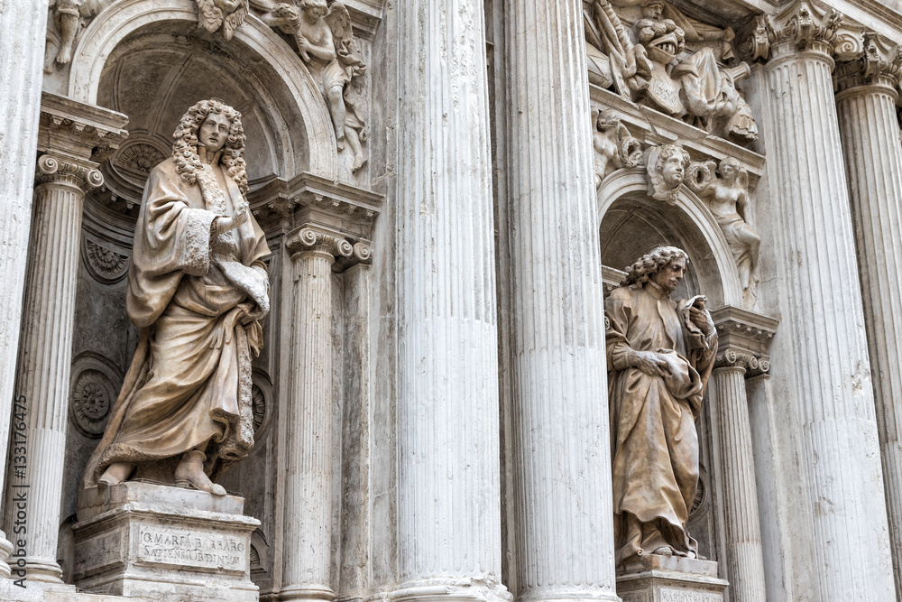 Statues in exterior of famous Venetian church named The Chiesa di Santa Maria del Giglio (Venice, Italy)