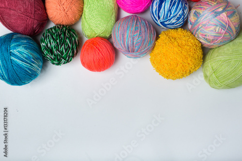 Balls of colored yarn. View from above. All the colors of the ra