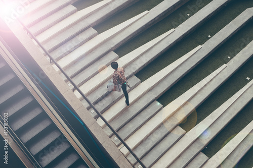 Man walking  motion blurred  with flare light and fade tone


