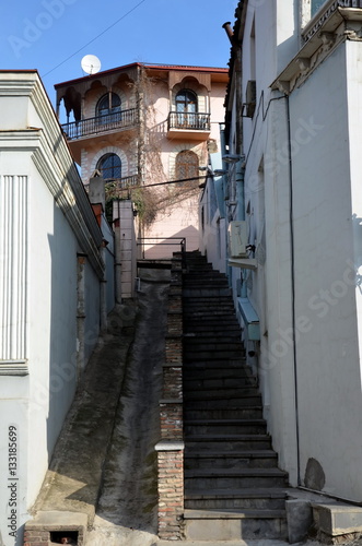 A small steep street with stairs in the old town of Tbilisi, Georgia