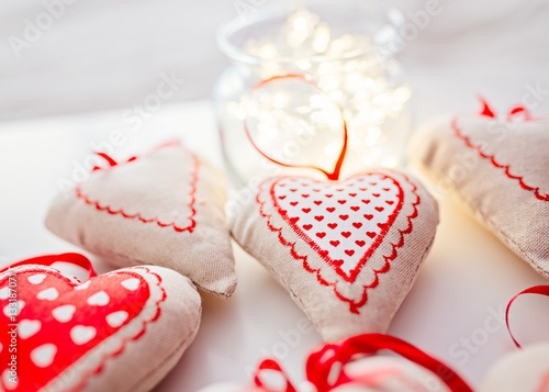 Fabric hearts on white background