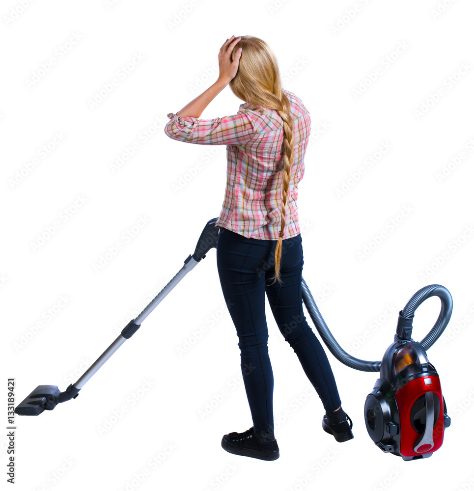 Rear view of a woman with a vacuum cleaner. She is busy cleaning. Rear view people collection. backside view of person. Isolated over white background. Girl in plaid shirt holding his head wearily. Rear view of a woman with a vacuum cleaner. She is busy cleaning. Rear view people collection. backside view of person. Isolated over white background. Girl in plaid shirt holding his head wearily.
