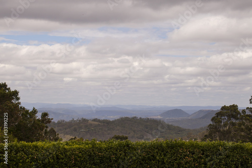 Over the Hedge. A view of the Lockyer Valley in Queensland Australia, from the top of the range near Toowoomba, looking out over Postman's Ridge and the national park. 