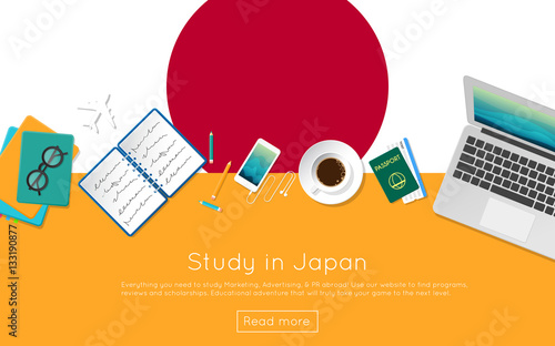 Study in Japan concept for your web banner or print materials. Top view of a laptop, books and coffee cup on national flag. Flat style study abroad website header.