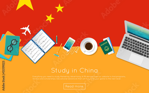 Study in China concept for your web banner or print materials. Top view of a laptop, books and coffee cup on national flag. Flat style study abroad website header.