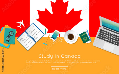 Study in Canada concept for your web banner or print materials. Top view of a laptop, books and coffee cup on national flag. Flat style study abroad website header.