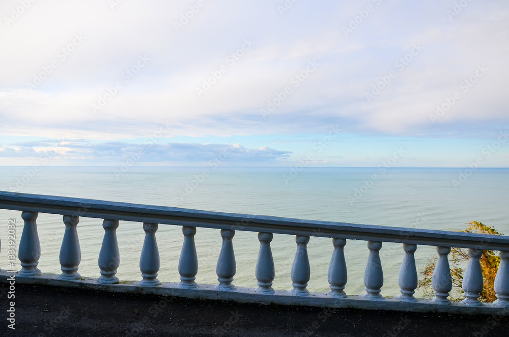 Railing overlooking the sea in a botanical garden. Batumi. Georgia. Railing overlooking the sea in a botanical garden. Batumi. Georgia.