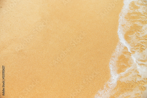 Sunny beach near Koggala - Sri Lanka. Waves of clear water and warm sand  photo