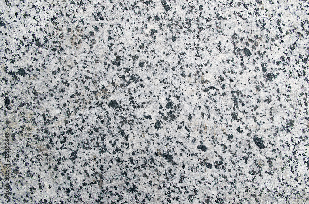 Natural stone gray granite background with untreated surface har Natural stone gray granite background with untreated surface har